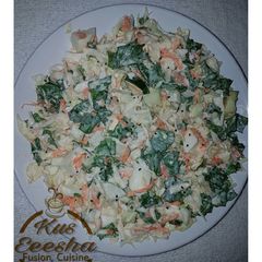 A picture of Vegetables and egg salad.