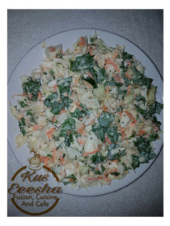 A picture of Vegetables and egg salad.