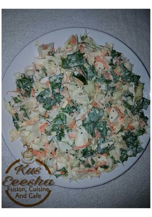 A picture of Vegetables and egg salad.