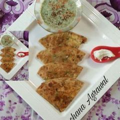 Boiled Egg Stuffed Paratha & Bathua ka Raita A picture of Boiled Egg Stuffed Paratha & Bathua ka Raita.