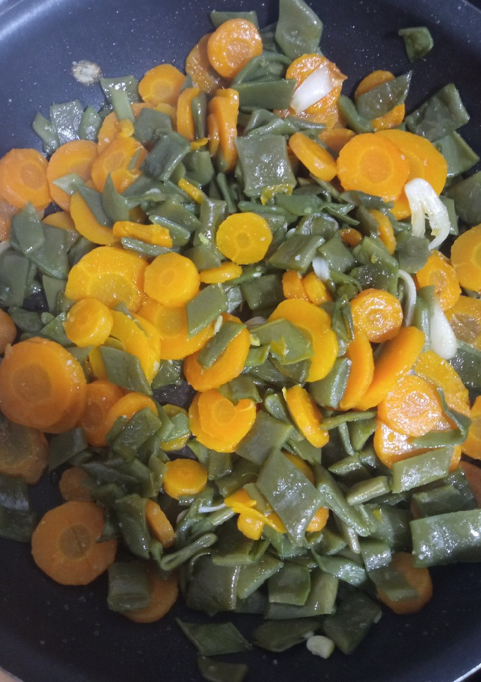 Una foto de Judías verdes con zanahorias