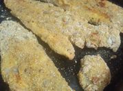 Una foto de condimento para milanesa de pescado