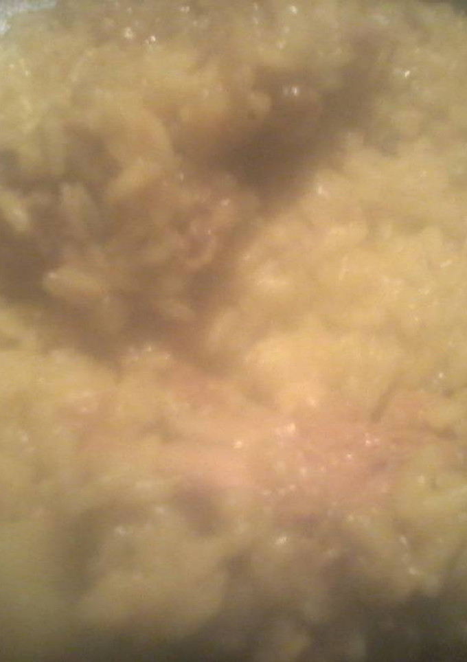 Una foto de Arroz amarillo con pollo