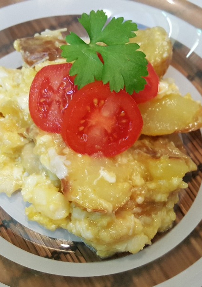 Una foto de Bacalao, patatas y huevos