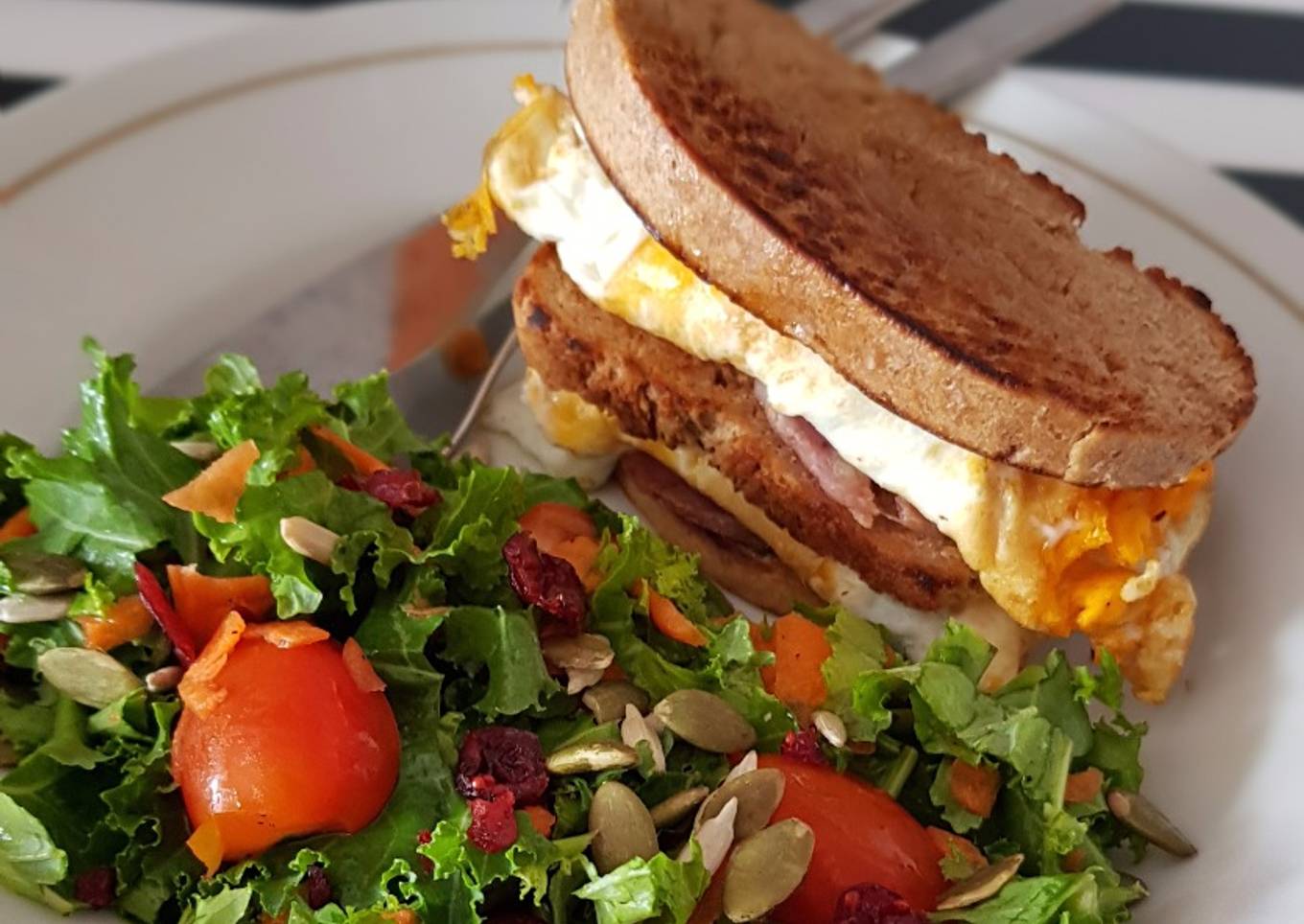 Egg bacon sandwich with Kale salad