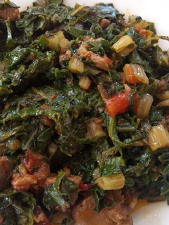 A picture of Fried Spinach with beef.