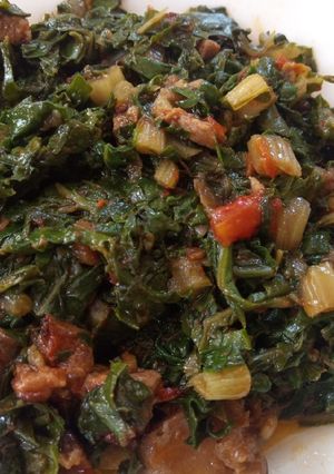A picture of Fried Spinach with beef.