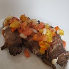Brad's steak roll up's with heirloom tomato relish A picture of Brad's steak roll up's with heirloom tomato relish.