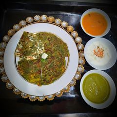 A picture of Palak Paneer Paratha.