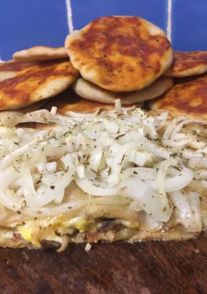 Una foto de Fugaceta y pizzetas a mi estilo, con harina integral y un toque de crema de leche