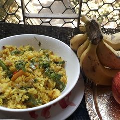 A picture of Kaanda Batata Poha (onion/potato poha).