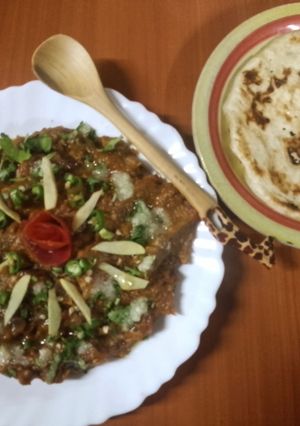 A picture of Baingan da bharta/ mashed grilled aubergines,🍆🧅🍅🌶️.