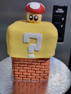 Una foto de Mini torta cubo Mario Bros sin gluten