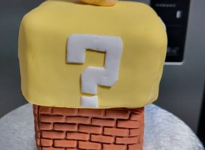 Una foto de Mini torta cubo Mario Bros sin gluten
