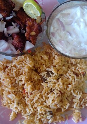 A picture of Biriyani Style Veg Pulao with Chicken 65.