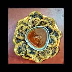 Spicy ALOO tikki/ POTATO CAKES with ketchup (with a healthier twist) A picture of Spicy ALOO tikki/ POTATO CAKES with ketchup (with a healthier twist).