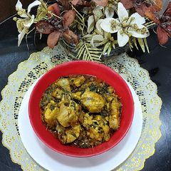 A picture of Chicken with fenugreek leaves.