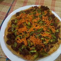 A picture of My cheeseless Pizza.