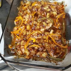A picture of Chicken breasts in pineapple and barbecue sauce.