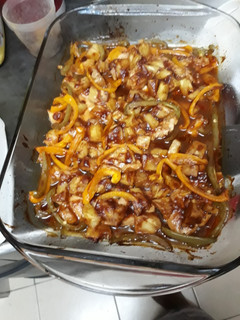 A picture of Chicken breasts in pineapple and barbecue sauce.