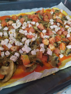Una foto de Pizza con base de coliflor