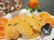 Una foto di scaloppine di petto di pollo