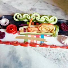 A picture of Cucumber snail or chain...And flower salad.