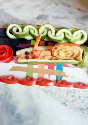 A picture of Cucumber snail or chain...And flower salad.