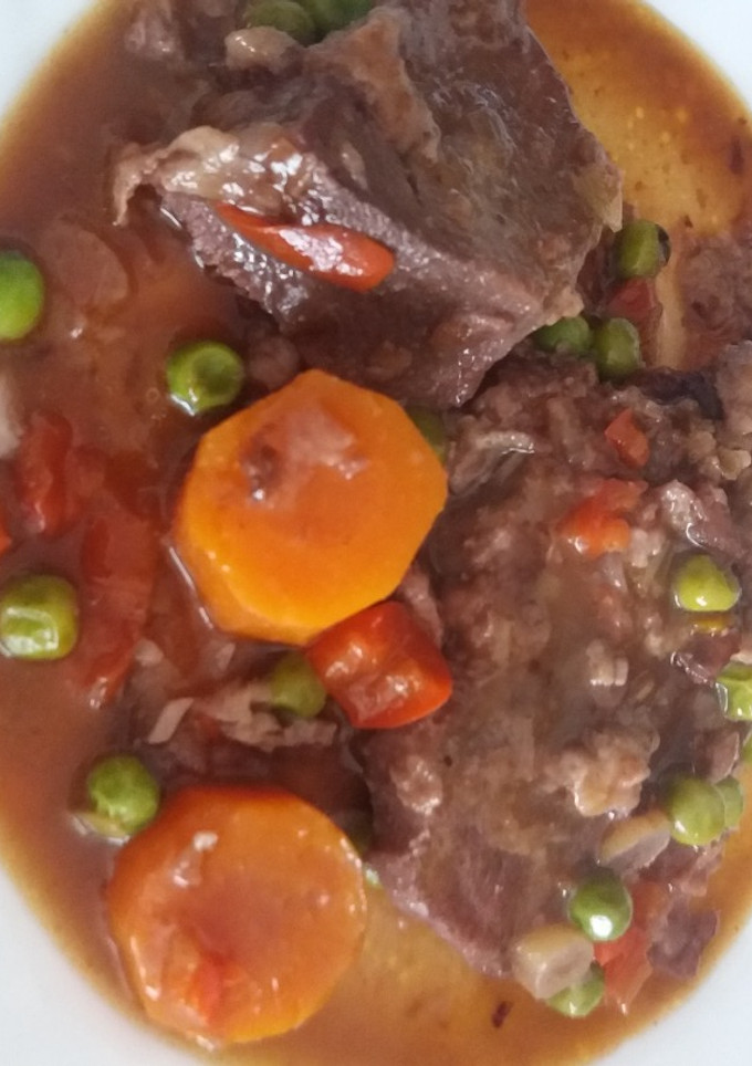 Una foto de Lengua estofada con vino tinto