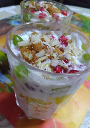 A picture of Creamy fruits and nuts delight.