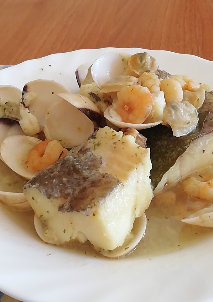 Una foto de Bacalao en salsa verde
