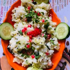 A picture of Leftover rice and Lauki Raita.