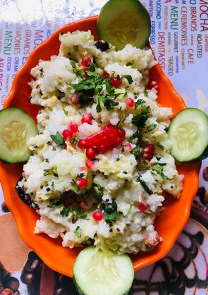 A picture of Leftover rice and Lauki Raita.