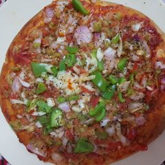 A picture of Onion Capsicum Cheesy Pizza.