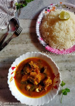 A picture of Mutton curry with Peyazkoli.