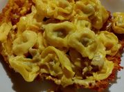 Una foto di pasta allo curcuma