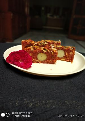 A picture of Carrot halwa and sweet potato gulab jamun terrine.