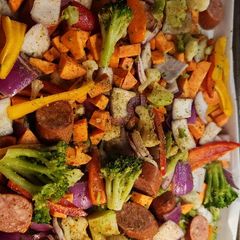 A picture of Kielbasa and vegetable sheet pan dinner.