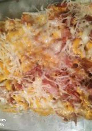 Foto principal de Patatas fritas con bacon, jamón y queso rallado