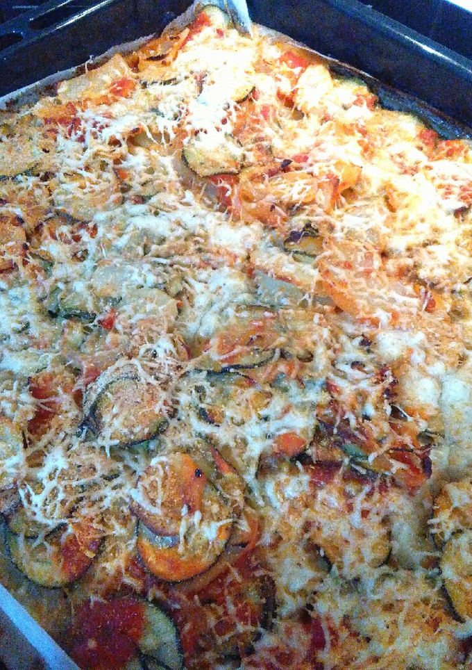 Una foto de Calabacines con queso al horno