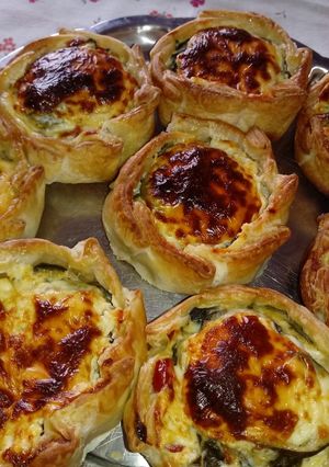 Una foto de Tartines de Zapallitos grarinados
