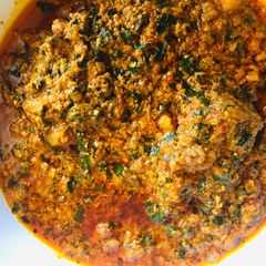 A picture of Egushi soup with bitter leaf.