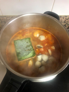 Una foto de Potaje con bacalao y almejas