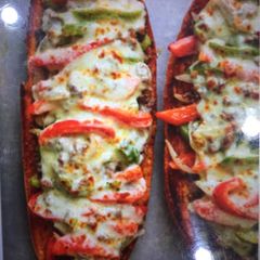 A picture of Ground beef mummy bread.