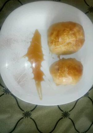 A picture of Egg wrapped in sausage and puff.