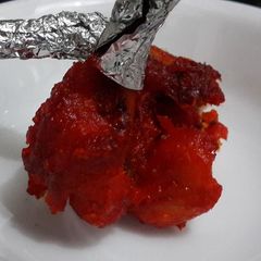 A picture of Chicken Lollipop.