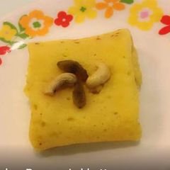 A picture of Banana Lakkottappam. (banana-coconut stuffed pancake).