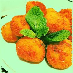 A picture of Potato 🍠 Mango balls.