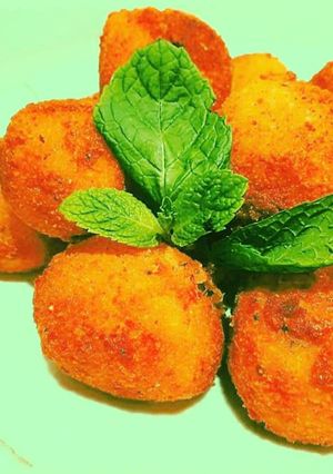 A picture of Potato 🍠 Mango balls.