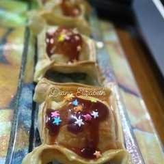 Una foto de Pastelitos de manzana y mermelada de tomate. 🍎🍅👩🏼‍🍳